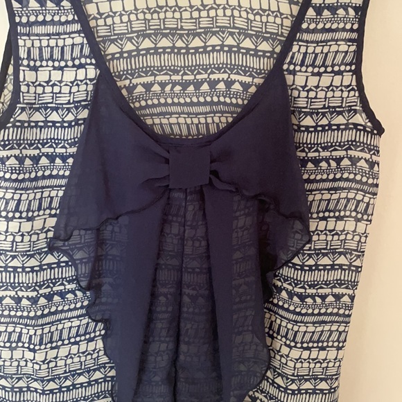 Navy Flowy top with bow in back. - Picture 2 of 3